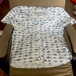 This is a ocean coast XXL shirt that has red white and blue on it